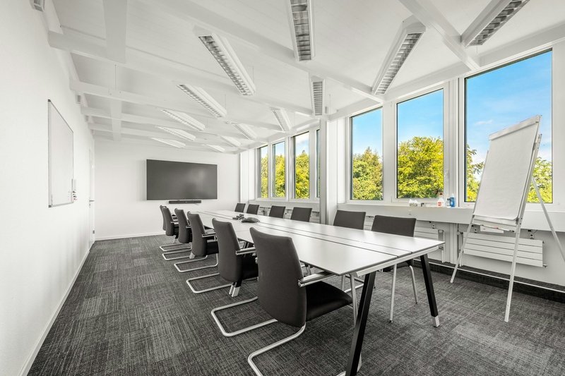 Gemeinschaftlich genutzte Sitzungszimmer