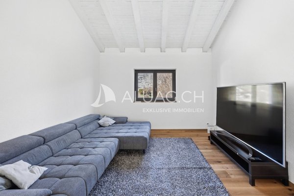 TV- oder Leseecke, ideal für entspannte Momente.