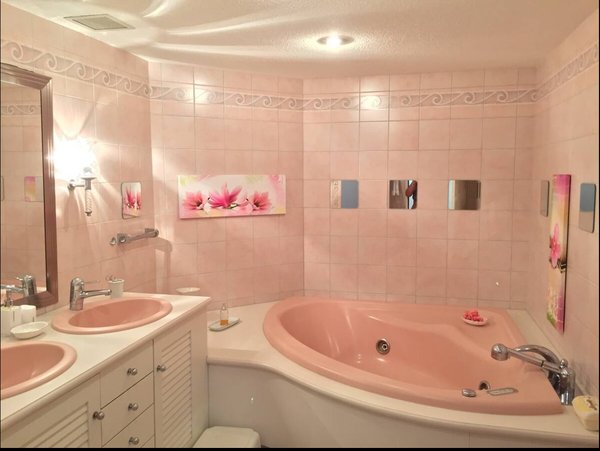 Spa-Like Comfort Unwind in a sleek bathroom featuring a jacuzzi tub your personal space to relax and recharge in peace