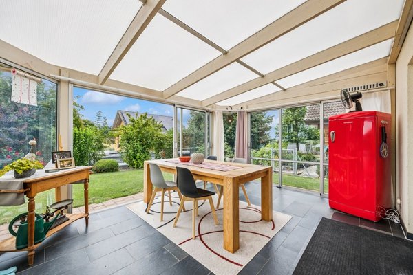 Wintergarten mit direktem Gartenzugang