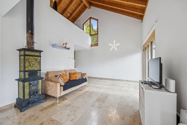 Wohnbereich mit Cheminée-Ofen