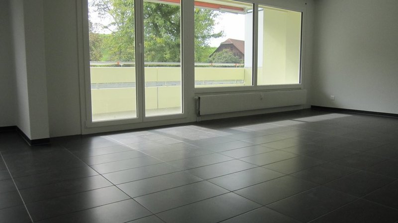 Wohnzimmer mit Balkon