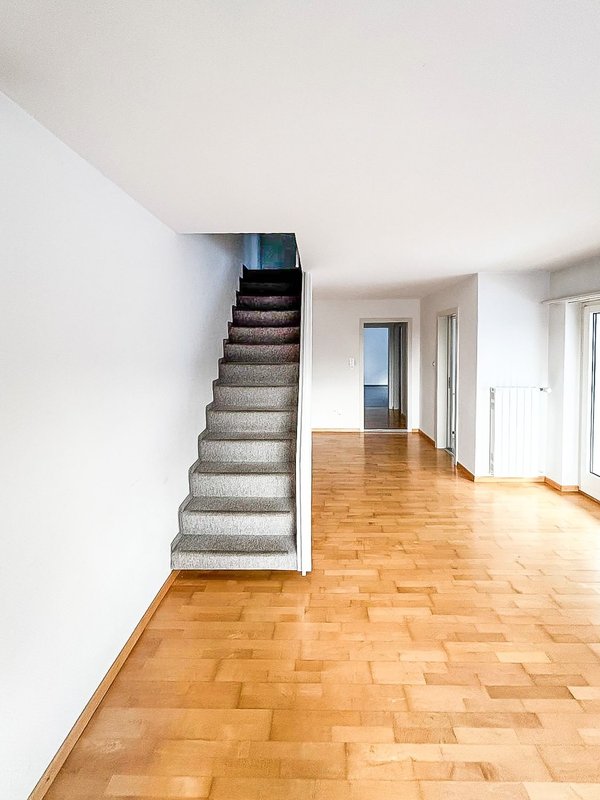 Wohnzimmer mit Aufgang