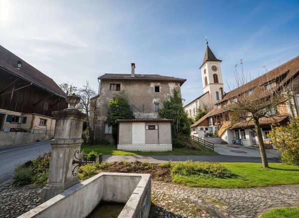 Brunnen vor dem Haus