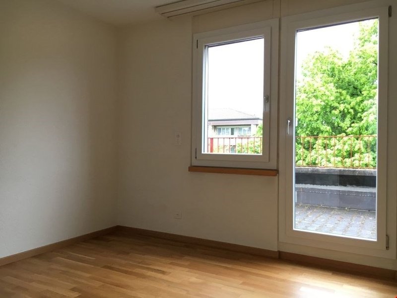 Zimmer mit Zugang zu einer Terrasse