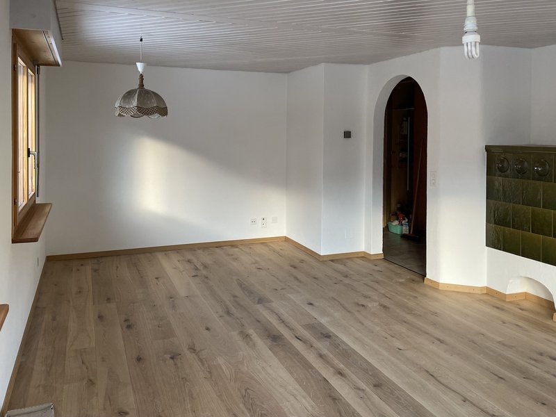 Wohnzimmer mit Kachelofen