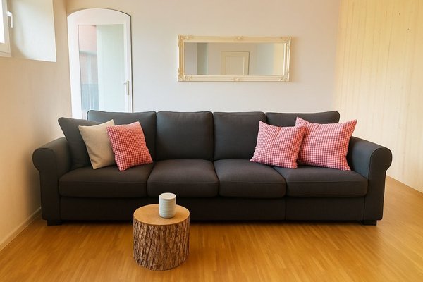 Herrenschwanden_H3_Wohnzimmer_Sofa.png