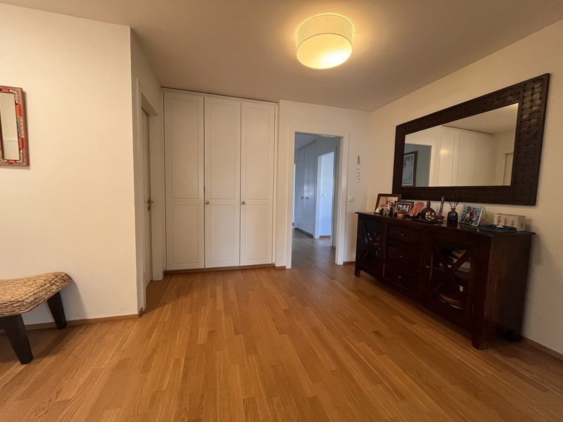 Large entry way with built-in closets