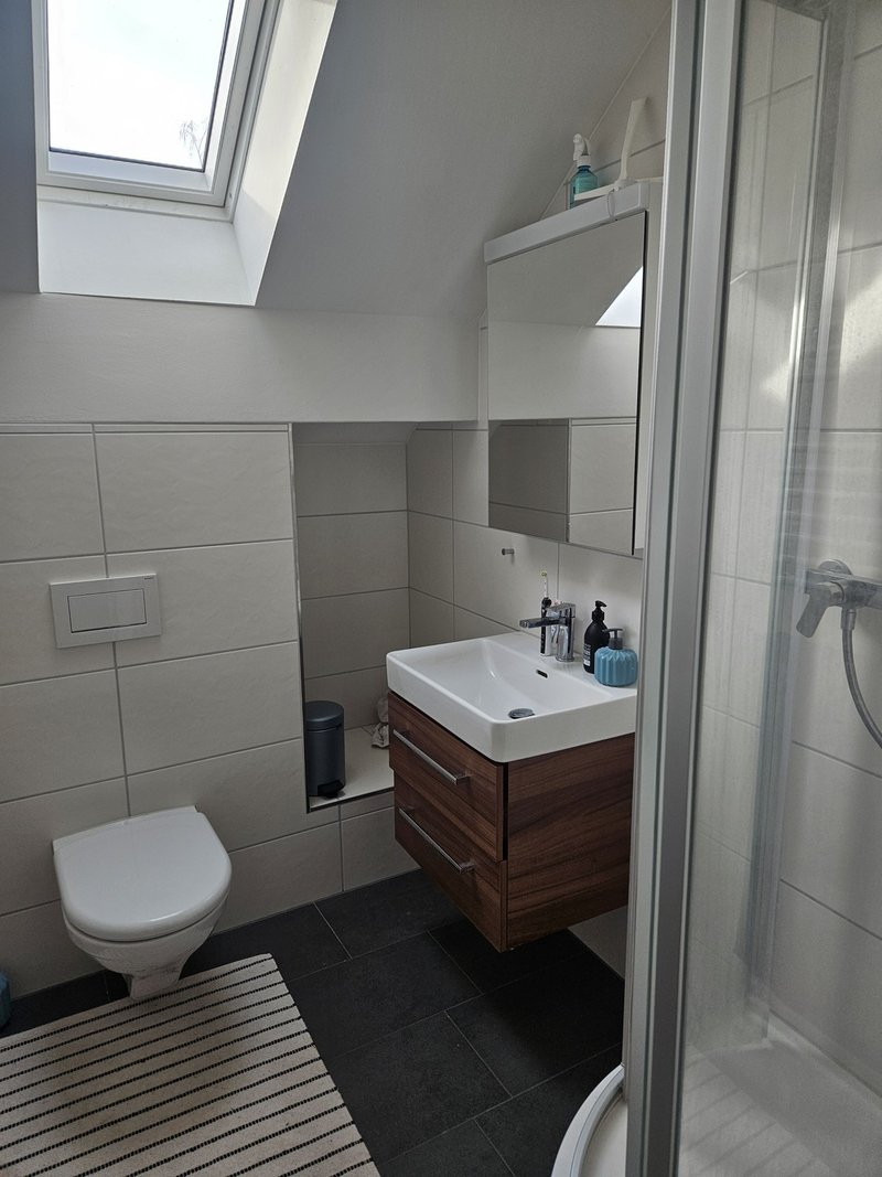 Upstairs bathroom with a shower for the roommate to use.