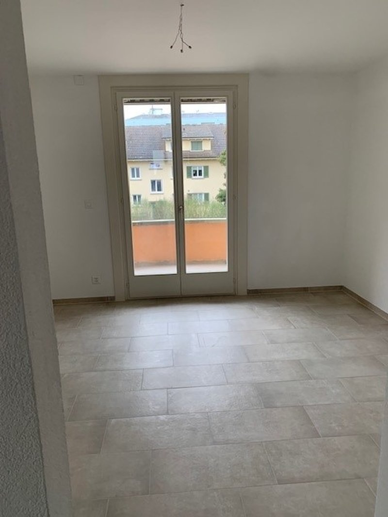 Wohnzimmer mit Balkon