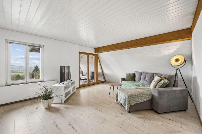 Offener Wohnraum mit Laubenzugang